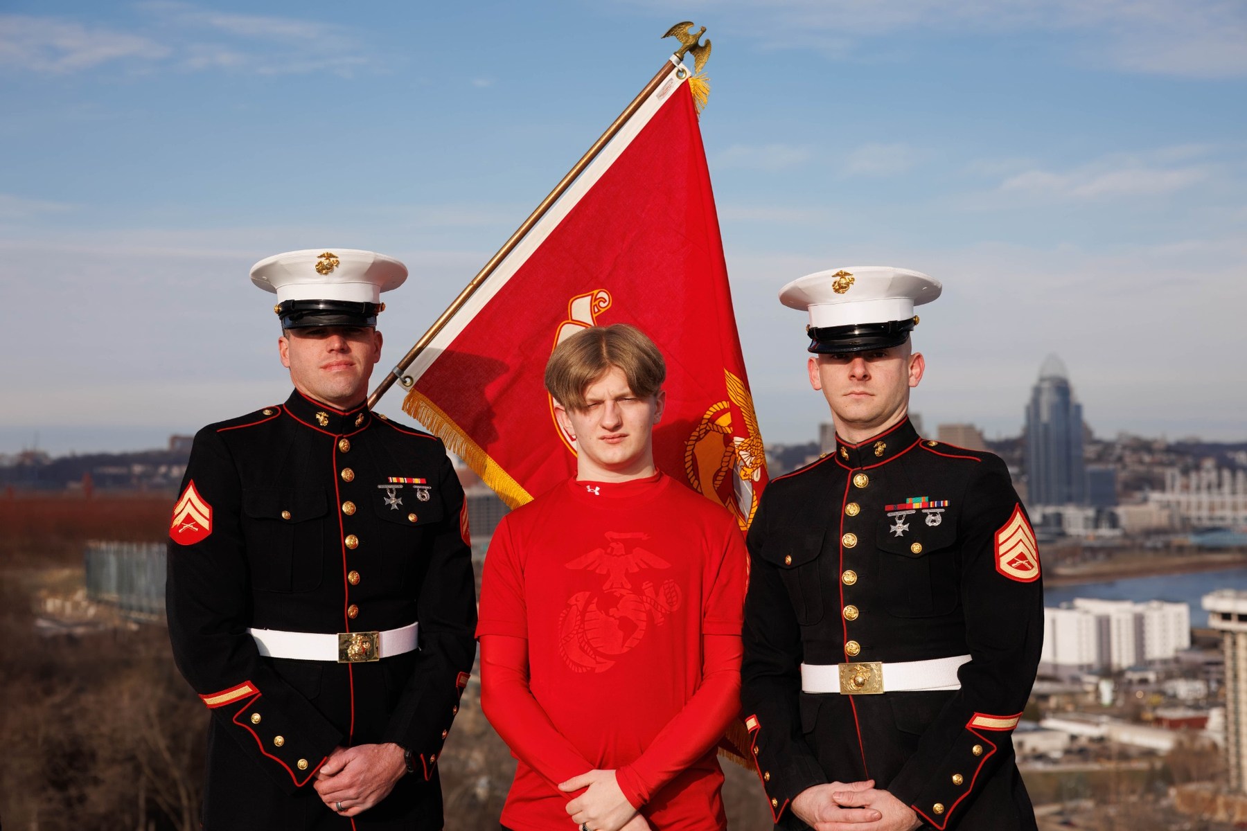 Senior portrait with two United States Marines and a Marine Corps flag