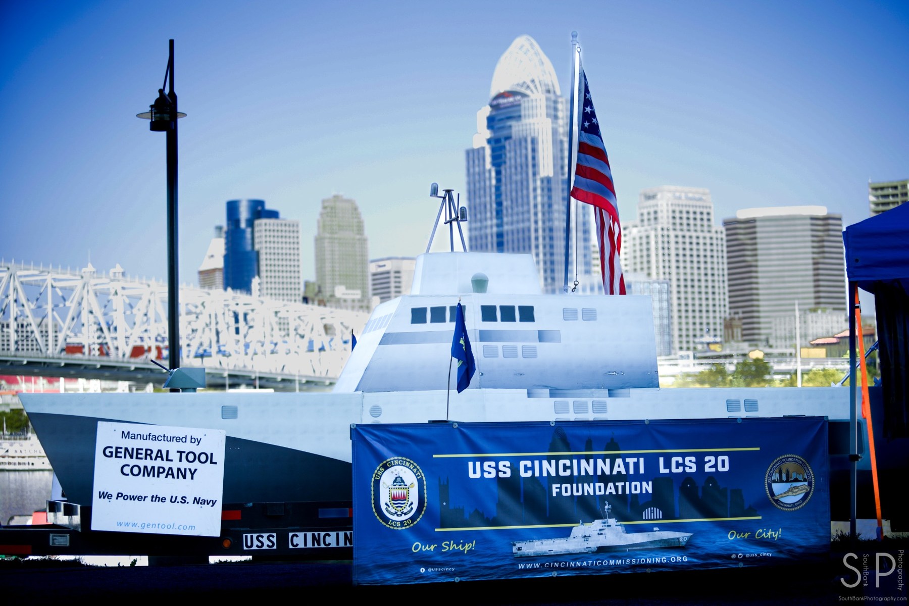 USS Cincinnati display with the Cincinnati skyline behind it